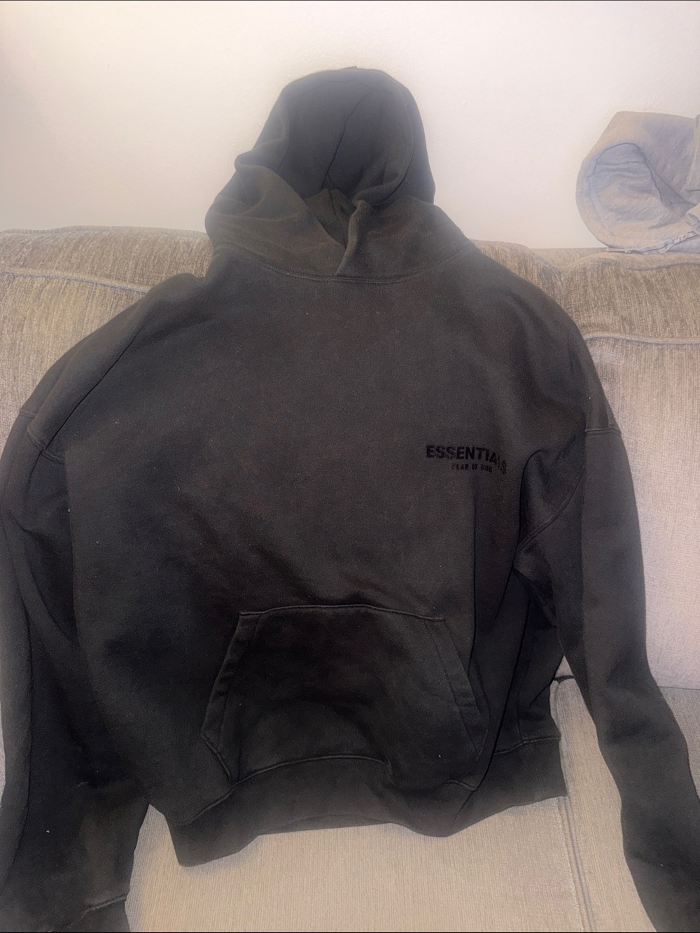 ESSENTIALS Black Pullover Hoodie with Subtle Chest Logo
